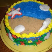 Under The Sea This is the second cake I made as a part of my senior project.White cake with colored BC frosting, brown sugar sand, gum paste shells....
