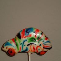 Painting On Car I was experimenting with Wilton's paste ... dipping a million tooth picks in the jar and swirling it around on slightly dry cookie...