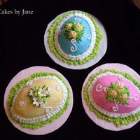 Easter Egg Cake Three cake orders for Easter. I used royal icing flowers and buttercream for the frosting and ruffles