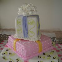 Shower Cake Presents Cheapest cake dummy around a cardboard box covered with packaging tape to make it moisture proof. I used an old tupperware lid for the...