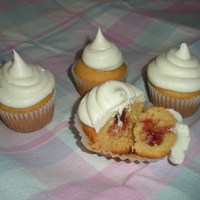 Peanut Butter & Jelly W/marshmallow Fluff Buttercream Frosting pb&J cupcake, stuffed w/strawberry jelly and topped with marshmallow fluff buttercream frosting