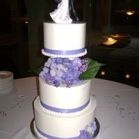 Purple Wedding Cake 6-8-10 inch cakes ... once I got it stacked I wished I would have made the 6 inch a 4 inch... I know for next time :)