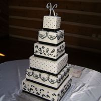 Black & White Wedding Cake This is the biggest stacked cake I've ever made. The bride saw a picture of a cake like this on this website and I tried to replicate...
