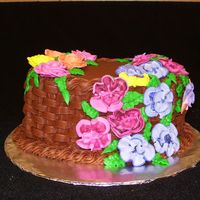 Wilton Course 2 Final Chocolate cake with chocolate buttercream. My frist attempt at basket weave and flowers
