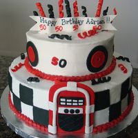 Adrian's 50Th 50's Theme Birthday BC with fondant accents. Cakes are 12" and 8" x 3"