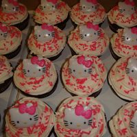 Hello Kitty Cupcakes / Cupcake Cake for my niece's 10th birthday.Chocolate cupcakes with buttercream frosting.