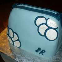 Blue Graphic Floral Purse Strawberry cake, white chocolate Godiva liqueur icing, Satin Ice fondant.