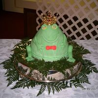 Froggie Goes A Courtin With His Crown This is my Frog dressed up in his crown and bow tie. He was the hitof the reception. People here aren't used to seeing fondant covered...