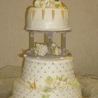 50Th Anniversary Cake I made this cake for our 50th anniversary party. A hobby baker, this was my first stacked/tiered cake.Buttercream icing, gumpaste roses,...