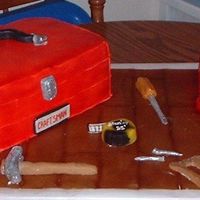 Dad's Surprise Cake This cake is a surprise for my Dad who suffered a stroke earlier this year. The tool box is 3 - 9x13 chocolate cakes stacked with chocolate...