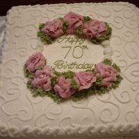 70Th Birthday Cake Had to make a quick birthday cake for my grandmother's birthday party. All buttercream with sparkles on top.