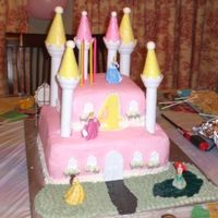 Disney Princess Castle Cake I did this cake for my daughter's 4th birthday. Buttercream icing with brick impression mats used. I used the Wilton Castle kit and...