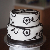 Engagement Cake Chocolate Cake. Satin Ice. Accents in Satin Ice Dark Chocolate. Cakes are 10" and 8".