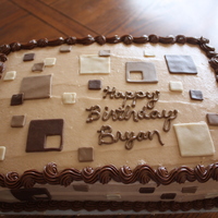 Bryan Chocolate cake. Mocha Buttercream. Fondant accents.