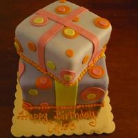 Birthday Presents Cake fondant covered cake, without its topper...looks a bit strange without it. oh well.