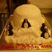 Penguin Birthday Cake White cake, BC icing, fondant penguins.