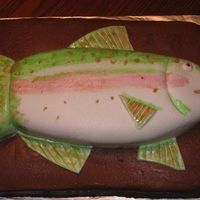 Rainbow Trout Quarter sheet cake with Chocolate BC frosting. Fish is covered in MMF and painted by hand. First attempt at that! Very fun.