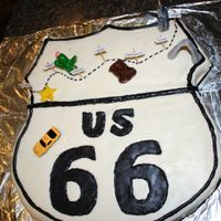 Route 66 Used a bunch of marshmallow fondant to cover the cake and create the path and "66"