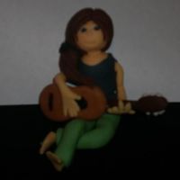 Miley This is Miley Stewart from Hannah Montana, made of fondant.