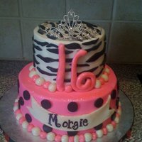 Zebra Sweet 16 Shirley temple and chocolate with buttercream and MMf accents. I used satin ice for the black to help me out a little.