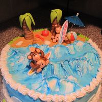 Monkey Beach Cake Tropical cake with buttercream and MMF/gumpaste figures.
