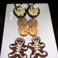Halloween Goodies (top to bottom) chocolate cupcakes with cream cheese Frangelico frosting (boilin cauldron Wilton design), taffy apple cookies, mini pumpkin...