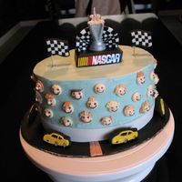 Nascar Cake Design taken from Wilton 2007 yearbook. Made for my nephew, who requested banana cake. I added cream cheese frosting, and banana/vanilla...