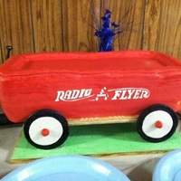 Radio Flyer Red Wagon Cake Wagon is cake, wheels are fondant. Made for a red wagon-themed baby shower.