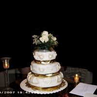 50Th Anniversary I made this cake two days before my wedding for my grandparents 50th anniversary. It is a vanilla cake covered with fondant. The hearts are...