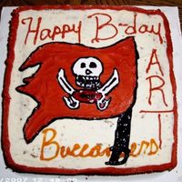 Bucs Cake I made this cake for my soon to be husband's birthday. It is a Trick or Treat cake (marble) with buttercream icing, gel, and a cannoli...