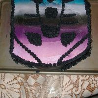 Decepticon Half Vanilla, Half Strawberry Cake with BC icing. This was the first time I used my airbrush gun!