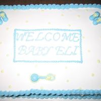Simple Baby Cake Baby Cake with Buttercream Booties and Rattle