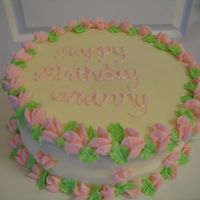 Flower Birthday This is a White Chocolate Cake with Vanilla Butter cream icing and flowers for borders.