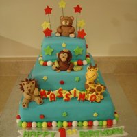 Animal Cake This cake was a lot of fun to make. The animals are all made of modeling paste. The all the other decorations are made of MF.