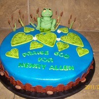 Frog Pond Buttercream icing, fondant and gumpaste accents....