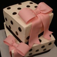 Pink And Brown Bridal Shower Customer saw a round cake and wanted it square and offset. Sometimes looks just don't transfer. I don't really like it square....