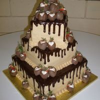 Groom's Cake I've done this cake a lot. Chocolate Devil's Food with Peanut Butter Buttercream and Chocolate Ganache. About 50 Chocolate dipped...