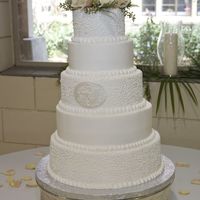 Monogram Wedding Cake Replacing picture of naked cake already posted. Photographer sent me a picture of cake after the florist placed the flower topper. All...