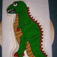 T-Rex Birthday Cake This was for a 5 year old's birthday. It's iced in BC and is a chocolate cake. I used the partysaurus pan from Wilton that is...