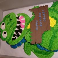 Hungry, But Not So Scary Alligator This is a slightly redesigned version of a wilton dragon cake I did for a little boy's b-day. Just iced like stripes instead of spots...