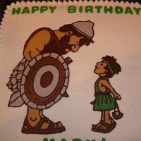 David And Goliath B-Day Cake This was my first try at a chocolate transfer and I have to admit that I'm pretty pleased with the results! Simple yellow cake w/...