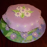 Delightful Daisies This was my course 4 final cake. Some of my favorite colors here together, and I just love doing the daisies! The cake is butterscotch...