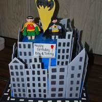 Batman And Robin Cityscape Batman and Robin and Gothan city for my sons' 5th birthday. Fondant buildings & figures and bat signal.