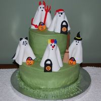 Trick Or Treating Ghosts Trick or Treating fondant ghosts on buttercream cake. Inspired by Shelly150 and other cakes on CC. The ghosts turned out to be a little too...