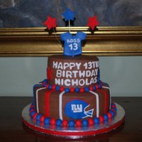 Ny Giants Birthday Cake NY Giants themed birthday cake for 13 year old boy. Chocolate BC with fondant decorations.