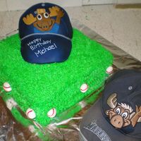 Baseball Hat This cake was made to be a replica of my son's favorite baseball hat from the Seattle Mariners.