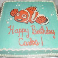 Nemo Here is my version of Nemo,thanks to the cc members pictures where i got my idea, made with piping gel, and vanilla cake.