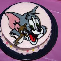 Smash Cake This was the smash cake to go along with her Tom & Jerry theme. Cake is marble with a FBTC transfer for the top. Confetti sugar hearts...