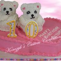 Double Vision My niece "designed" this cake for her 10th birthday. Double hearts are marble, teddy bears are yellow cake and all done in BTC...