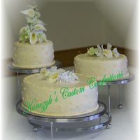 Poseybenscoter.jpg There was a total of 4 cakes in this order. The 6" and 10" are french vanilla with red raspberry filling, the 8" shown is...